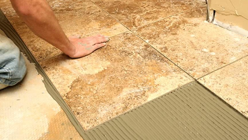 Tiling a bathroom floor on Long Island